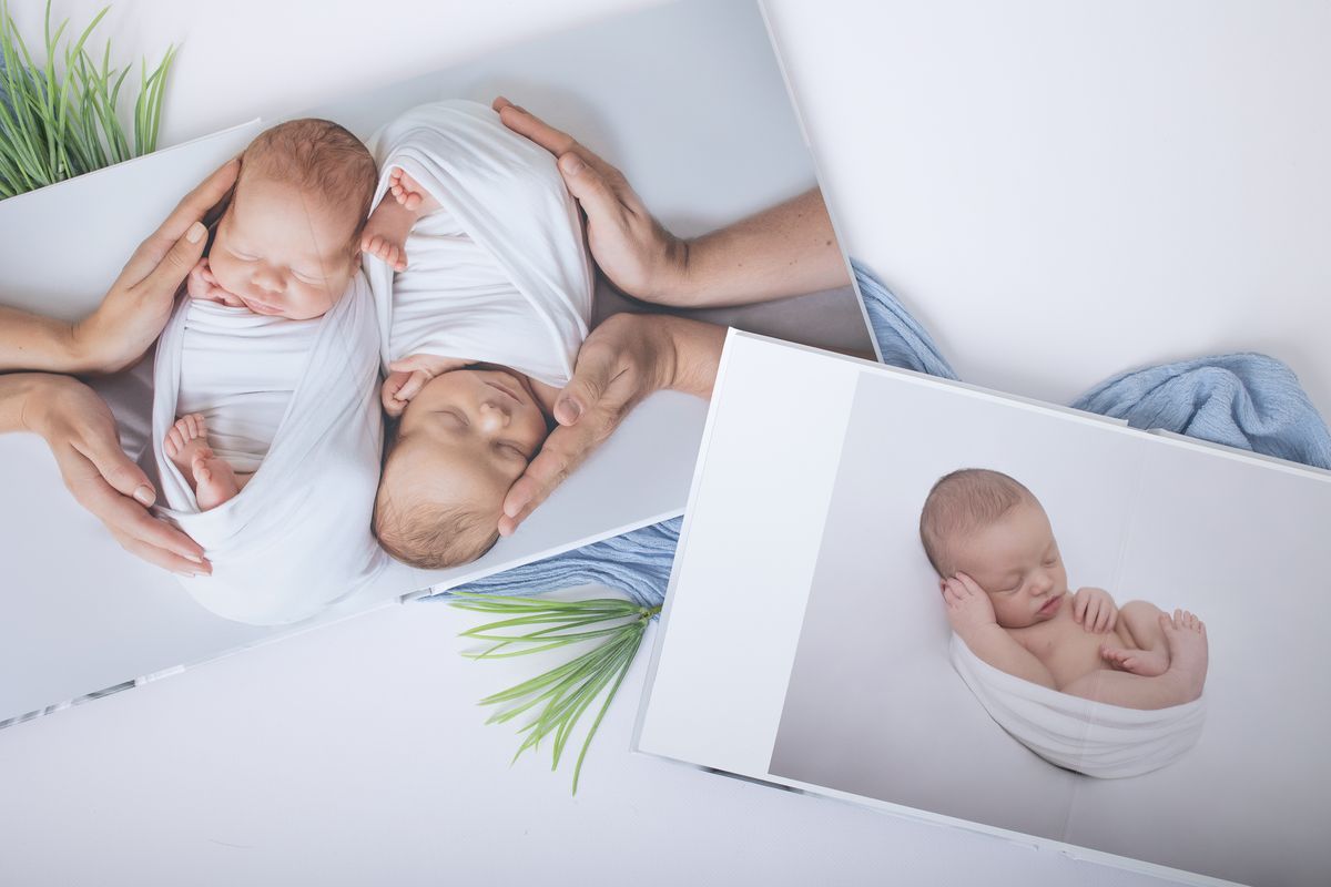 Pearl Fotoalbum offen aufgeschlagen mit Baby Fotos
